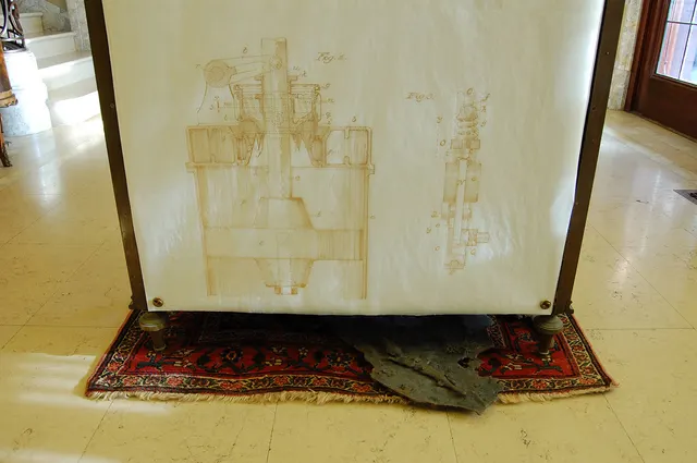 Alembic I: drawing detail and iron slag on floor