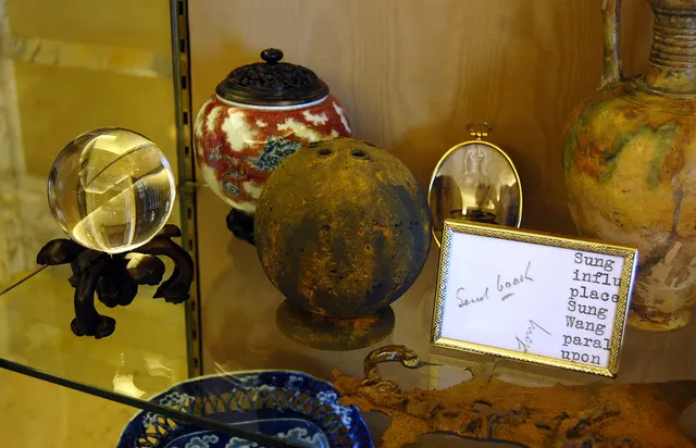 Alembic I: globe forms with documentation marginalia (”send back”) and cast iron version of text