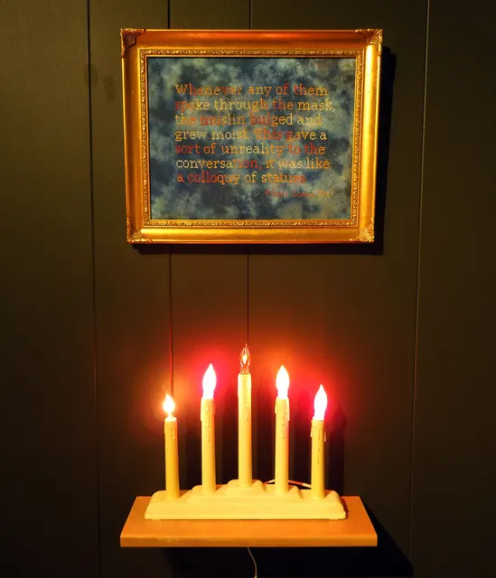 Miasma II: wall detail with Camus embroidery and flickering electric candles