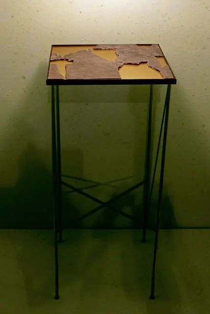 Mneme I: Kenilworth, Milwaukee: table with floor tile relic
