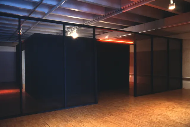 Mneme XII: Voices: main section of gallery with fiberglass screen wall and neon lintel