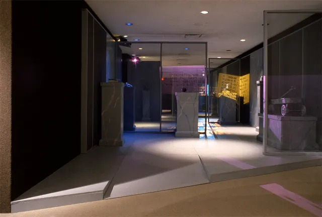 Mneme XVIII: Rites of Passage: entrance to installation: false floor and screen walls
