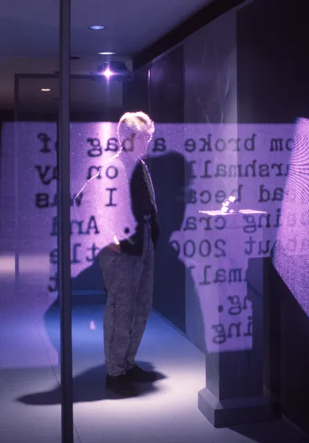 Mneme XVIII: Rites of Passage: detail: viewer interrupting projection beam
