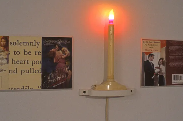 Surveying Desire VII: The Pathology of the Heart: detail: romance novel frieze and animated electric candle