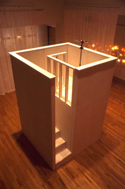 Surveying Desire VIII: Reconnaissance: observation tower from above with view of entry wall and candles