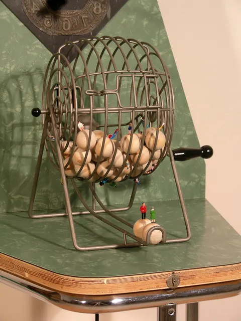 Surveying Desire XIV: Fortuna: bingo cage with figures on balls