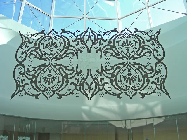 Surveying Desire XV: Overtures: window detail with Virgo emblem